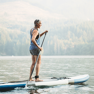 Person paddle boarding