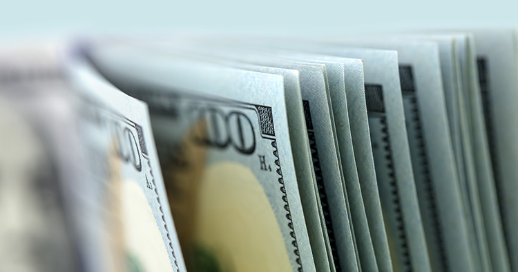 close-up image of one hundred dollar bills
