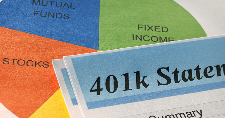 A photo of a stack of papers including a pie graph showing financial information and a 401k statement.