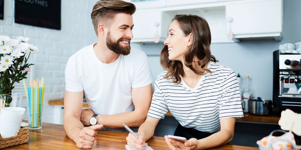 millennial couple enjoying each others company during financial discussion