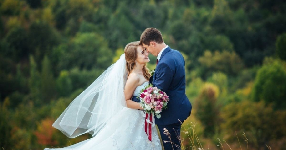 young couple getting married outside