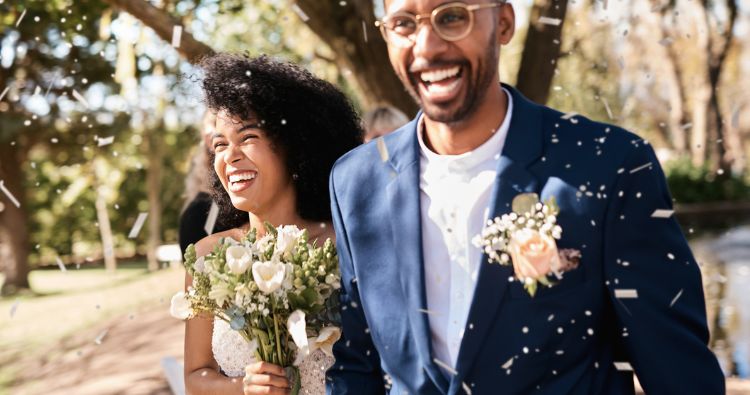 young couple getting married outside