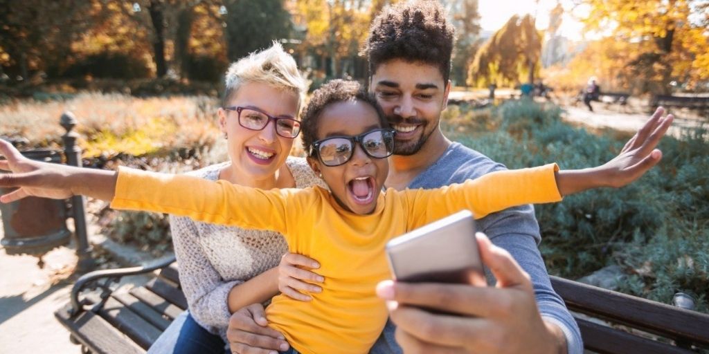 Young family takes a cute selfie.