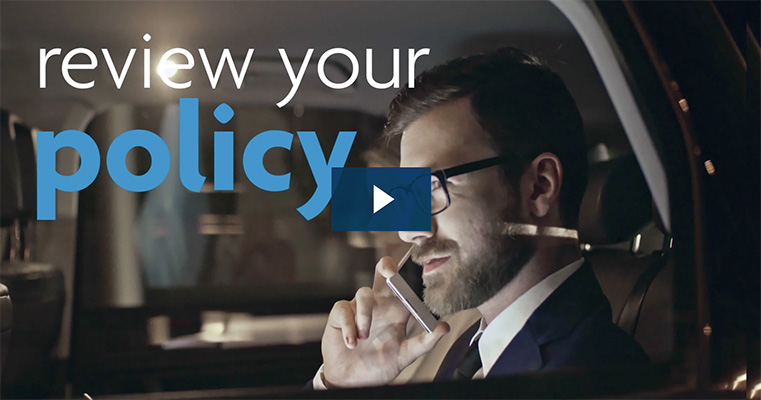 Tips for reviewing your life insurance policy video thumbnail of a man on the phone in a car.