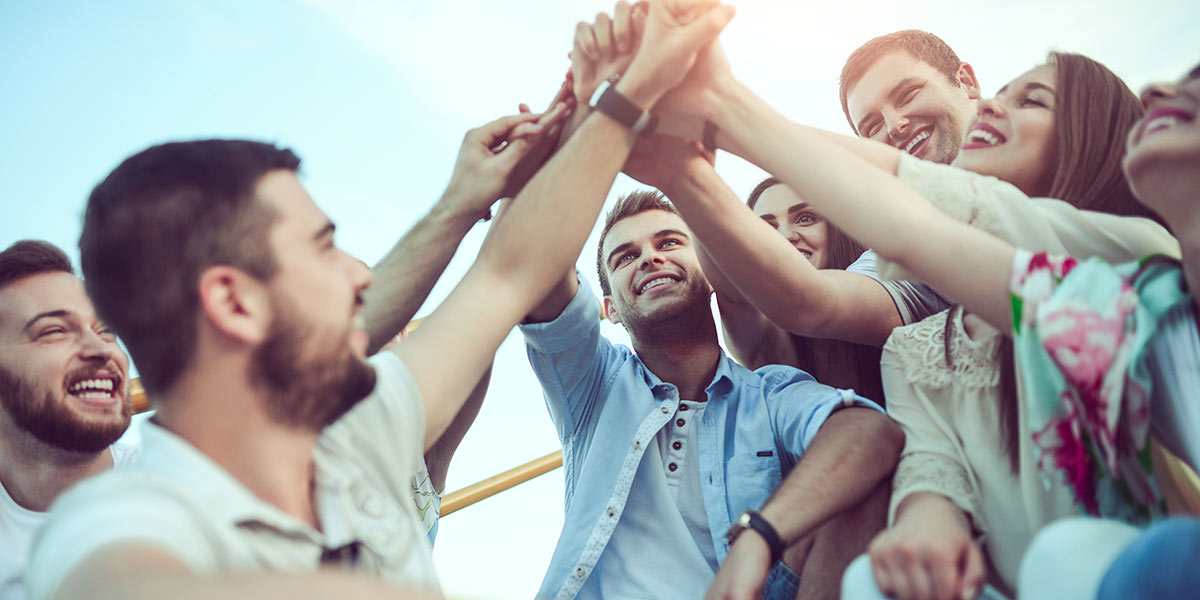 Group of people high fiving