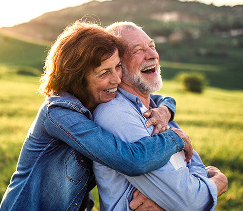 Woman hugging a man